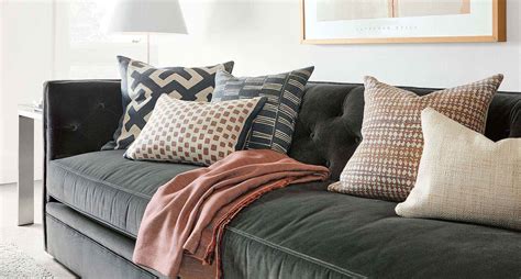 <p>Mid-century styling meets modern comfort in the <b>Jasper</b> ottoman. . Room and board pillows
